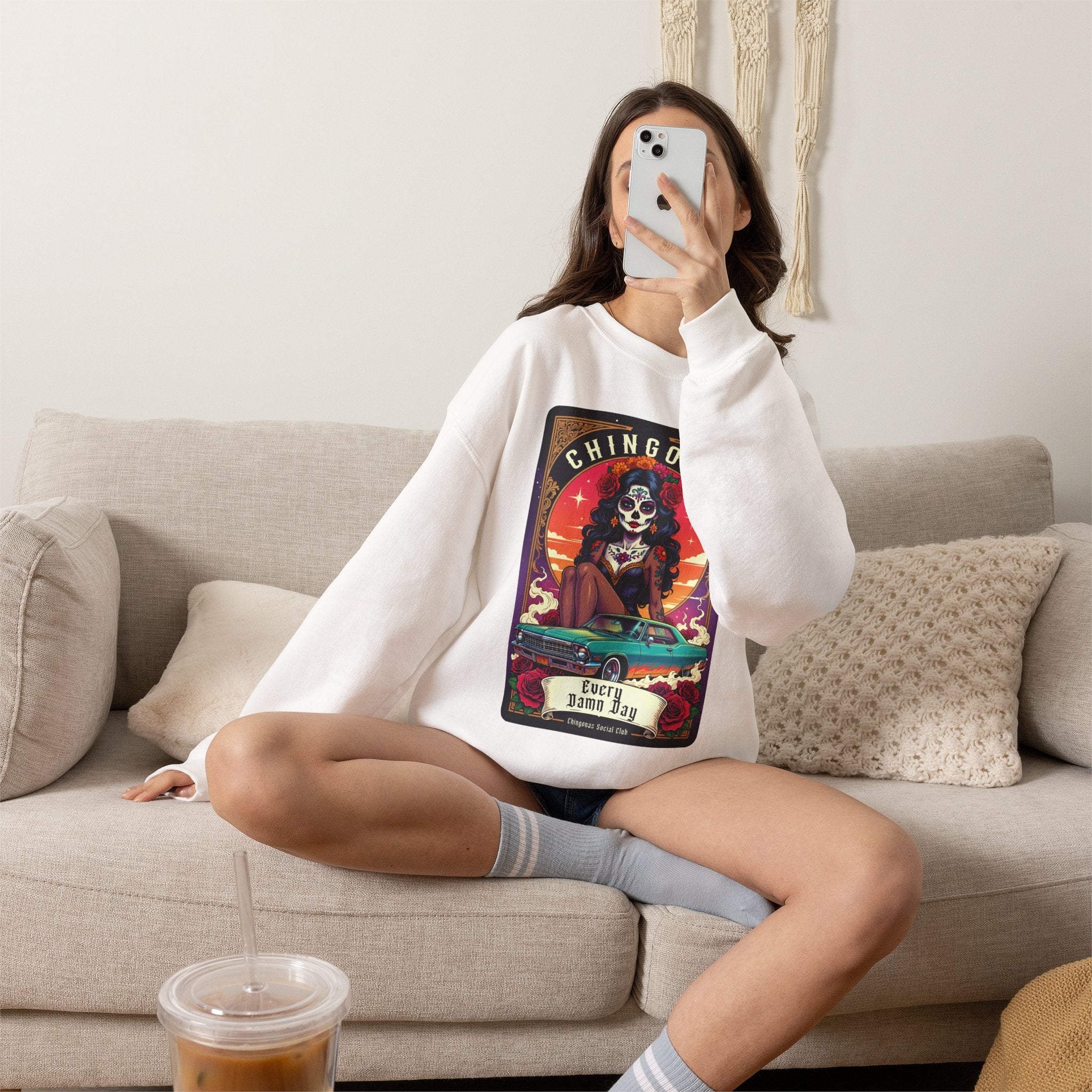 Chingona lowrider skull crewneck lifestyle - bold Dia de Muertos chicana streetwear pullover