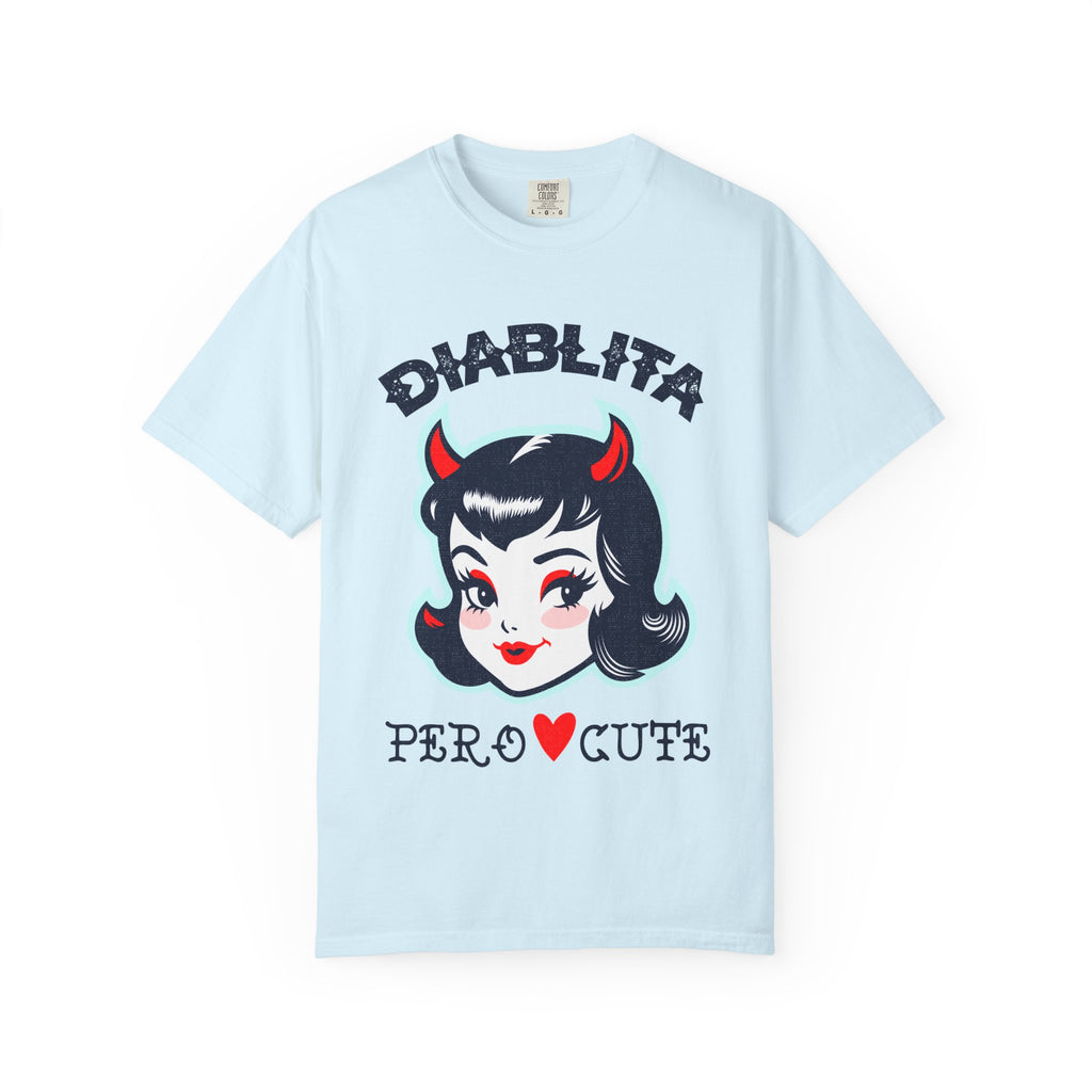 Comfort Colors® t-shirt featuring the playful "Diablita Pero Cute" retro devil girl graphic. Inspired by Chicana culture, Latina fashion, and vintage pin-up aesthetics, perfect for everyday streetwear and unique gift ideas.