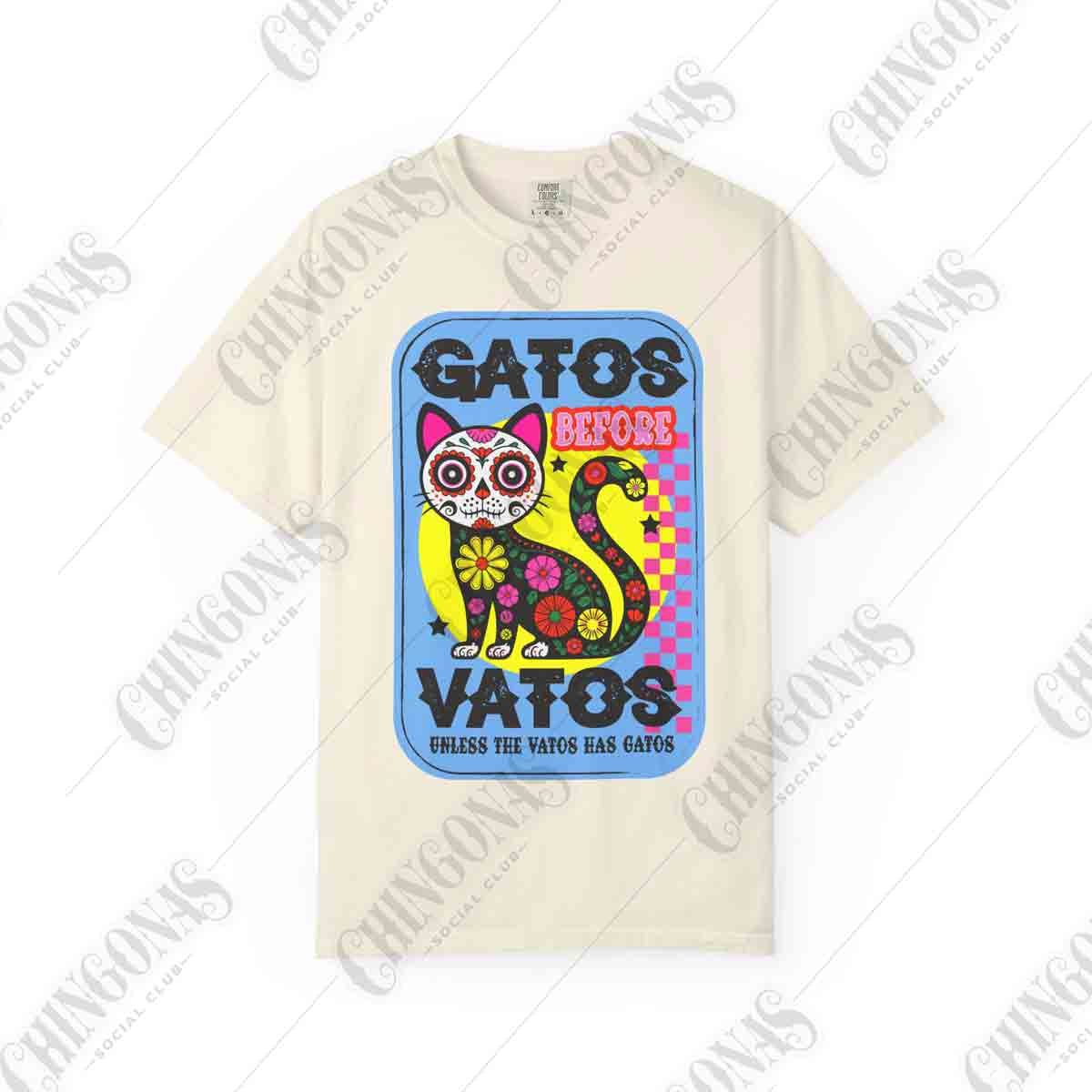 t-shirt featuring a colorful Day of the Dead cat with flowers and the phrase Gato Before Vato.