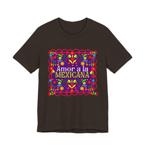 A beautiful Latina woman wearing a T-shirt with a colorful Mexican folk art design titled “Amor a la Mexicana.”