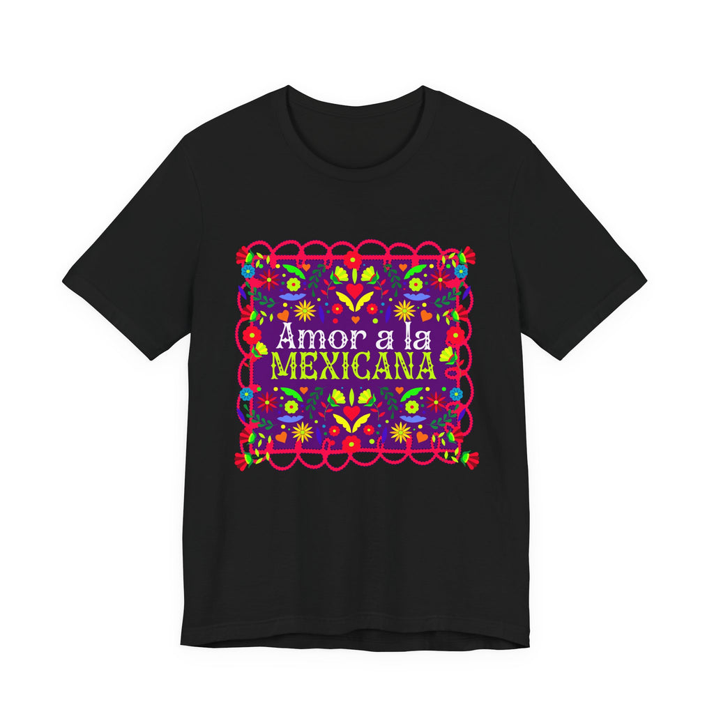t-shirt with pink "Amor a la Mexicana" text surrounded by a colorful floral frame inspired by Mexican folk art.