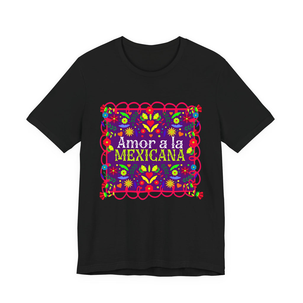A beautiful Latina woman wearing a T-shirt with a colorful Mexican folk art design titled “Amor a la Mexicana.”