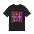 A beautiful Latina woman wearing a T-shirt with a colorful Mexican folk art design titled “Amor a la Mexicana.”