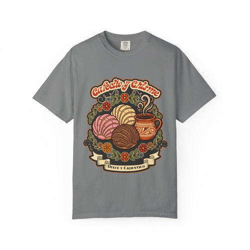 t-shirt with a vintage illustration of conchas, a traditional Mexican coffee mug, and the phrase Cafecito y Chisme.