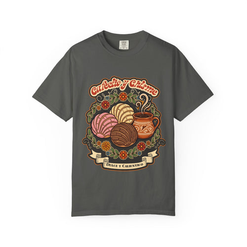 t-shirt with a vintage illustration of conchas, a traditional Mexican coffee mug, and the phrase Cafecito y Chisme.