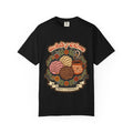 t-shirt with a vintage illustration of conchas, a traditional Mexican coffee mug, and the phrase Cafecito y Chisme.