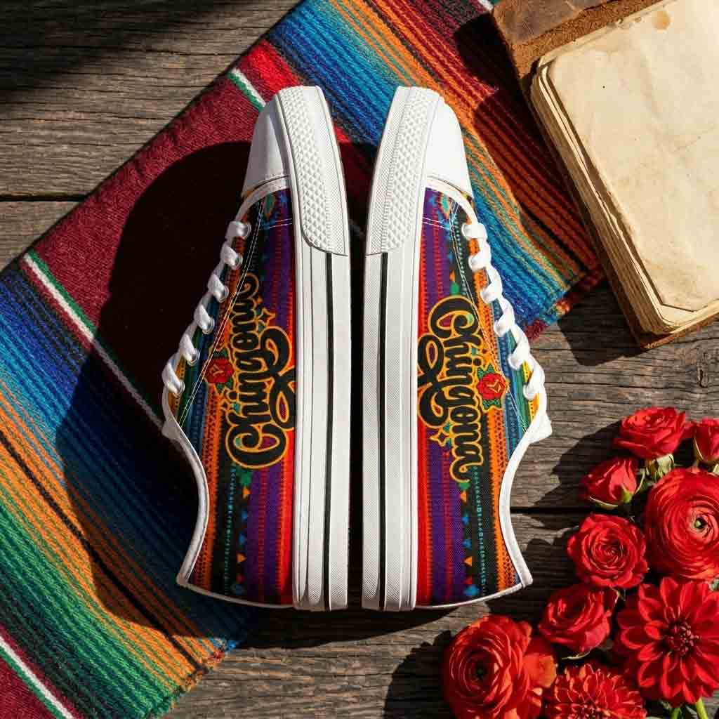 Chingona Aztec print low-top sneakers side view - colorful serape canvas Latina shoes