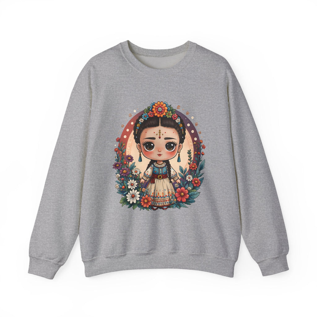 A sweet folkloric illustration of a little Frida girl with flowers and a bird printed on a cozy Gildan 18000 crewneck sweatshirt.