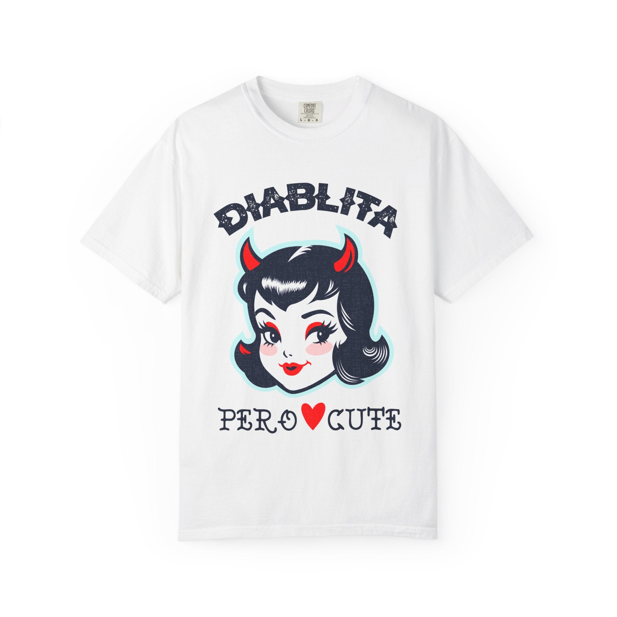 Diablita Pero Cute Comfort Colors graphic t-shirt featuring a retro devil girl design inspired by Chicana fashion and vintage pin-up style.