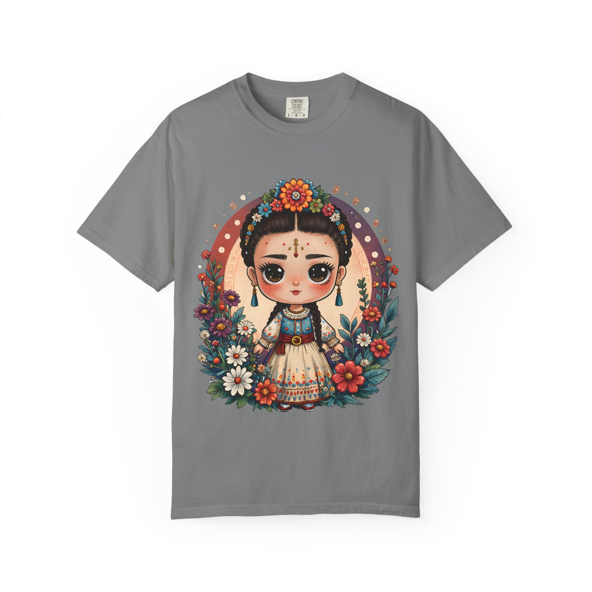 Whimsical Mexican folk art doll with floral crown and celestial accents on a heavyweight cotton t-shirt.