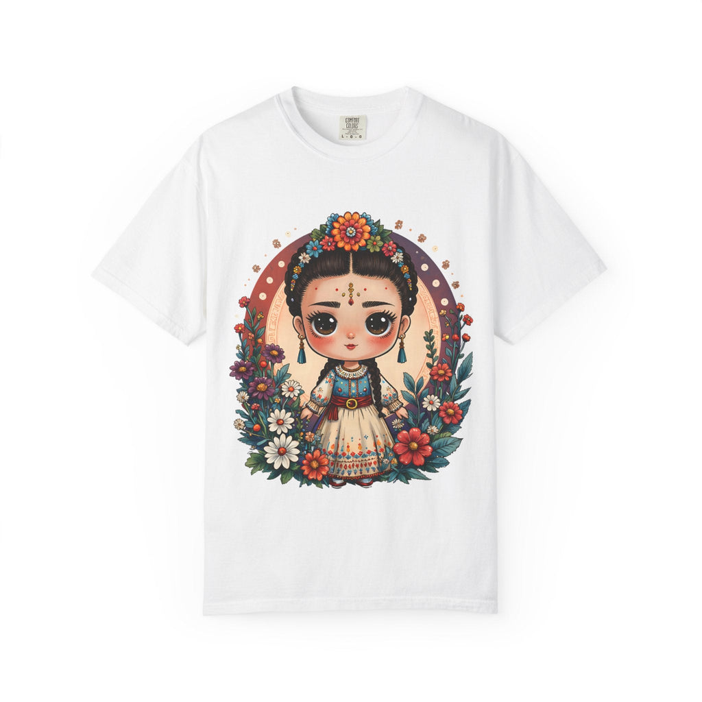 Whimsical Mexican folk art doll with floral crown and celestial accents on a heavyweight cotton t-shirt.