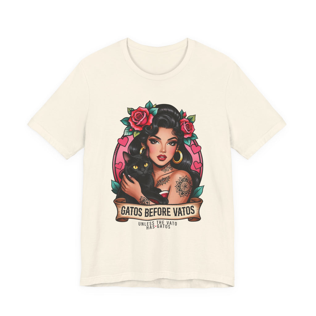 Latina model wearing a grey Gatos Before Vatos shirt with a tattooed woman and black cat illustration.