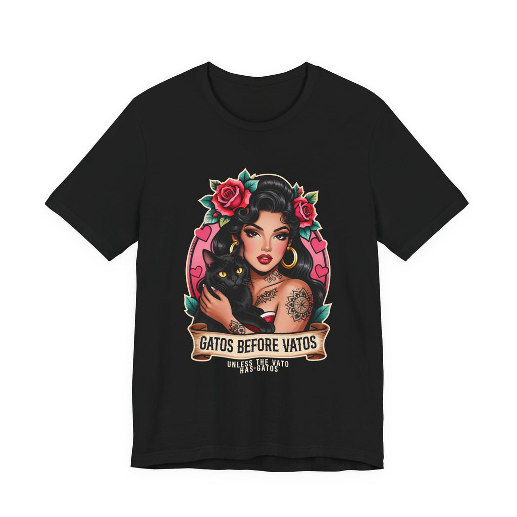 Latina model wearing a grey Gatos Before Vatos shirt with a tattooed woman and black cat illustration.