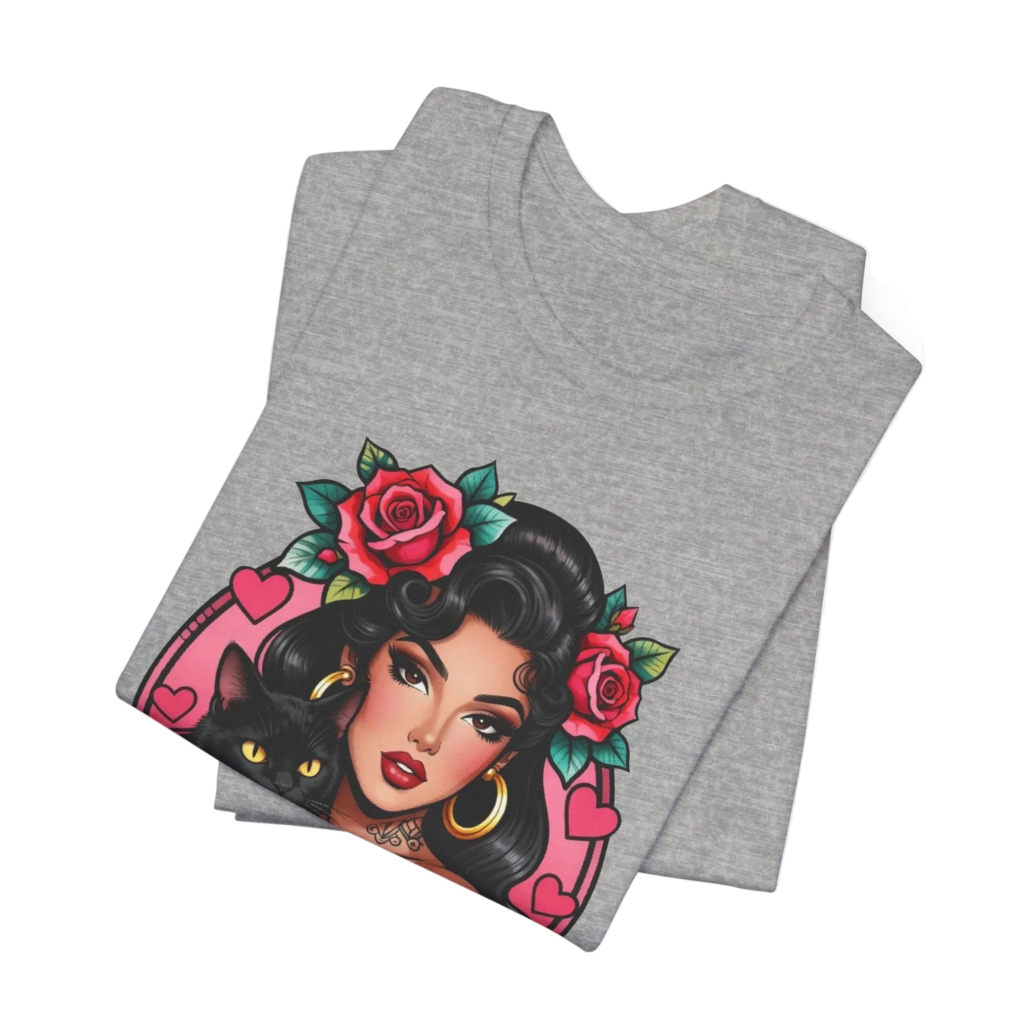 Latina model wearing a grey Gatos Before Vatos shirt with a tattooed woman and black cat illustration.