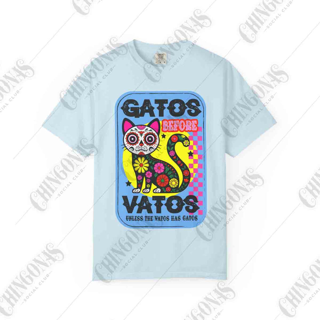 t-shirt featuring a colorful Day of the Dead cat with flowers and the phrase Gatos Before Vatos.