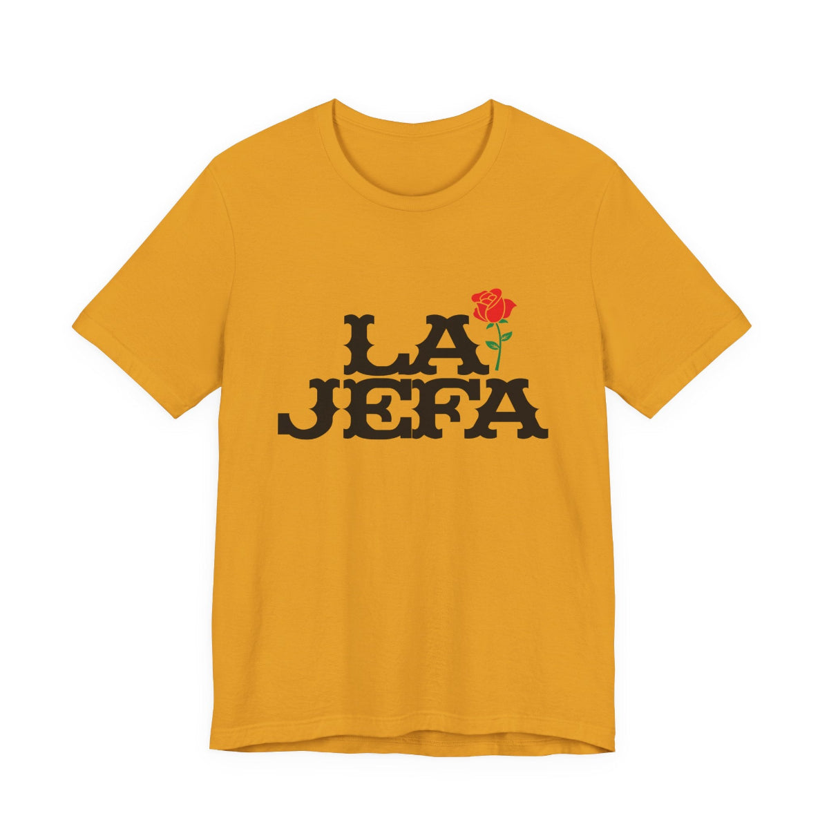 Mustard yellow t-shirt with bold black text reading LA JEFA and a small red rose graphic, representing Latina leadership.