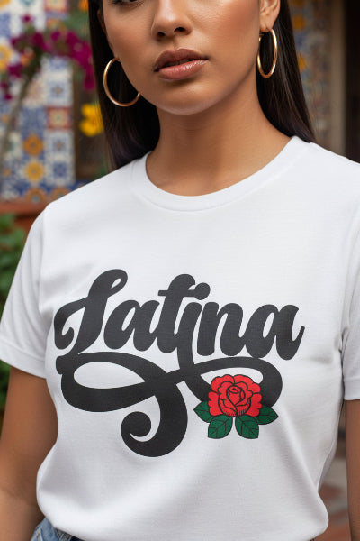 white t-shirt with "Latina" written in black script and a small red rose graphic on the end of the text.
